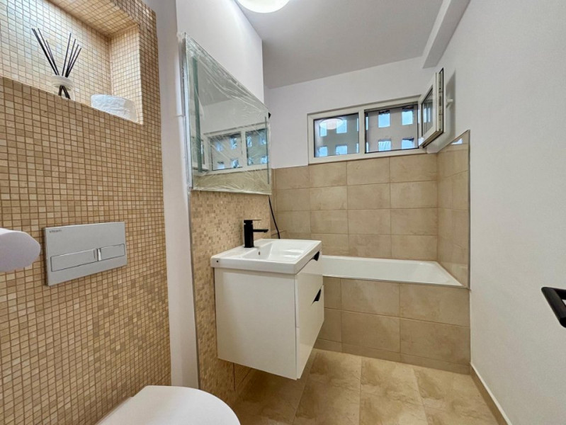 POLICLINICA TITAN / P-TA SALAJAN / RENOVAT COMPLET / GATA DE MUTARE